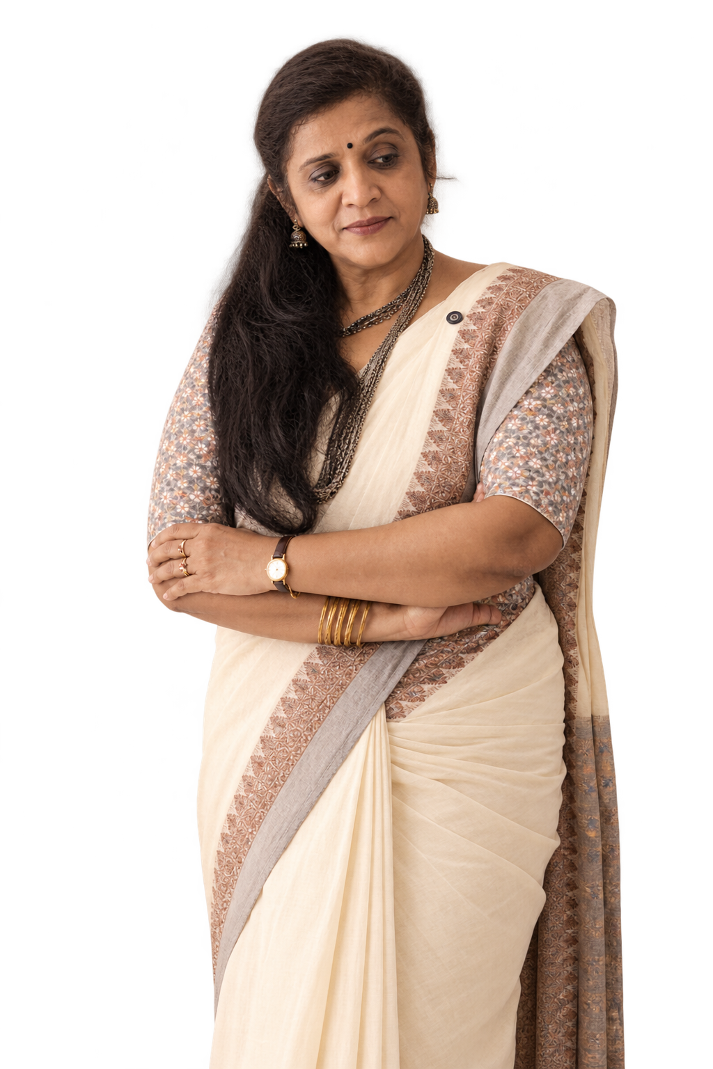 Portrait cut-out of Dr. Selvi seated thoughtfully in her consulting room