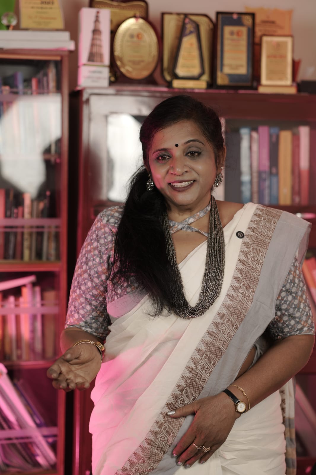 Dr. Selvi Shanmugi seated in her tranquil consulting library in Erode